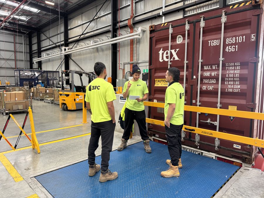 3PC crew briefing in a live warehouse